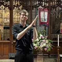 Alex Kyle clapping